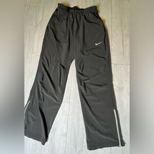 Nike running  track  dri fit pants size XL Men grey  reflected zip bottom .